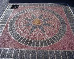 A wider view of the stencil concrete sundial in Dorset. A wider view of the stencil concrete sundial in Dorset.